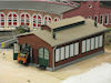 Download the .stl file and 3D Print your own  Two Stall Engine House HO scale model for your model train set.